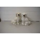 A pair of Staffordshire dogs