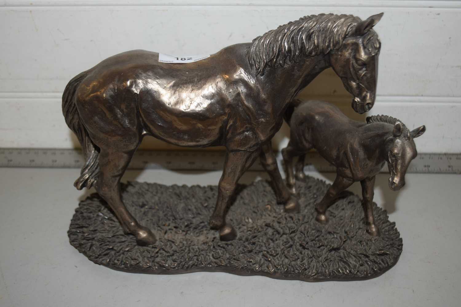 Modern bronzed resin of mare and foal