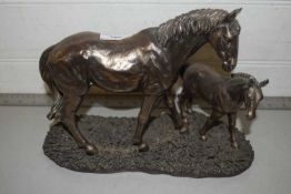 Modern bronzed resin of mare and foal