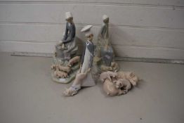 Mixed lot comprising two Lladro figures with pigs together with a further Lladro pig family and