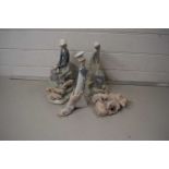 Mixed lot comprising two Lladro figures with pigs together with a further Lladro pig family and