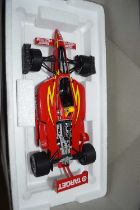 A boxed action Jimmy Vasser 12 racing car