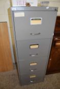 Metal four drawer filing cabinet