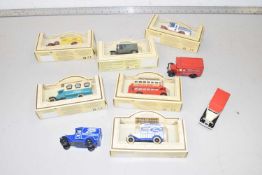 A collection of mostly boxed Lledo Days Gone By vehicles
