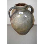 Large terracotta double handled jar with pouring lip