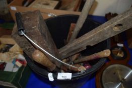 A bucket of workshop hand tools