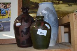 A Lladro vase and two other pottery vases