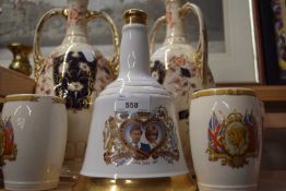 Pair of vases together with Royal Wedding commemorative decanter and other Royal commemoratives