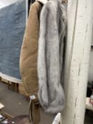 Vintage fur coat together with a sheep's skin coat
