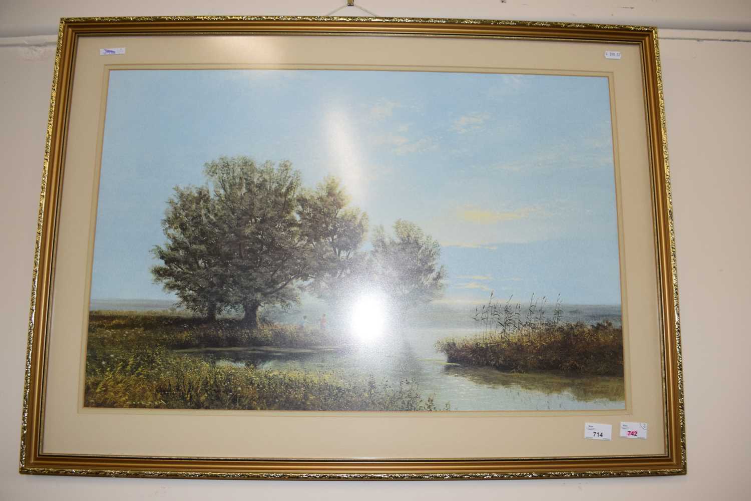 A reproduction colour print of a landscape by David Shepherd, framed and glazed together with