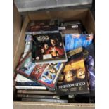 One box of various DVD's to include Star Wars