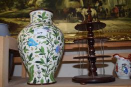 Continental style pottery vase together with a bobbin stand?