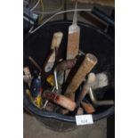 Bucket of assorted workshop tools
