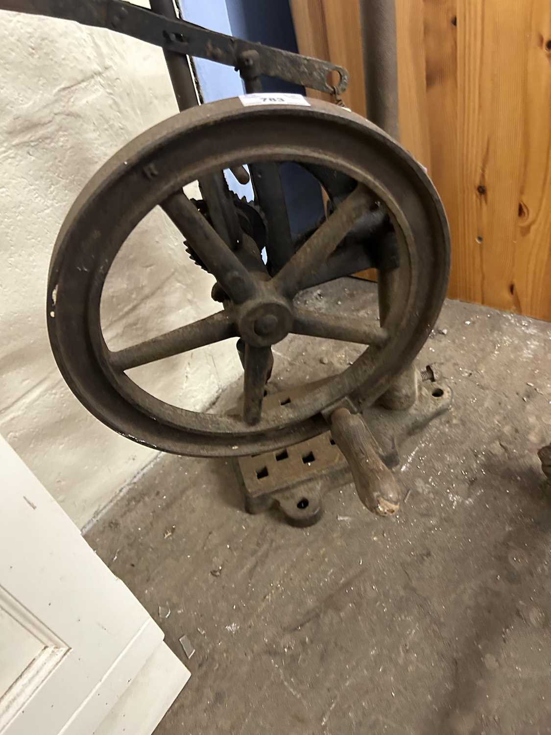 Cast iron blacksmiths drill together with a foot operated grinder