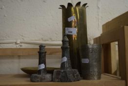 Two serpentine carved lighthouses together with a Trench art vase and other metal wares