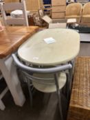 Pale green and brush aluminium oval dining table with two chairs
