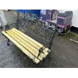 Cast iron garden bench with vine leaf decorated back and wooden slatted seat, 120cm wide