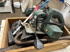 Bosch circular saw together with other workshop contents