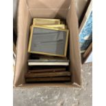 Box of assorted frames and prints