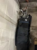 Case of assorted golf clubs