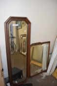 A rectangular octagonal wall mirror with faux maple and gilt surround together with an arched mantel