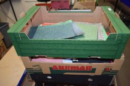 Three boxes of assorted crafting paper