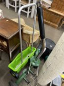 Lawn spreader together with a two wheel trolley