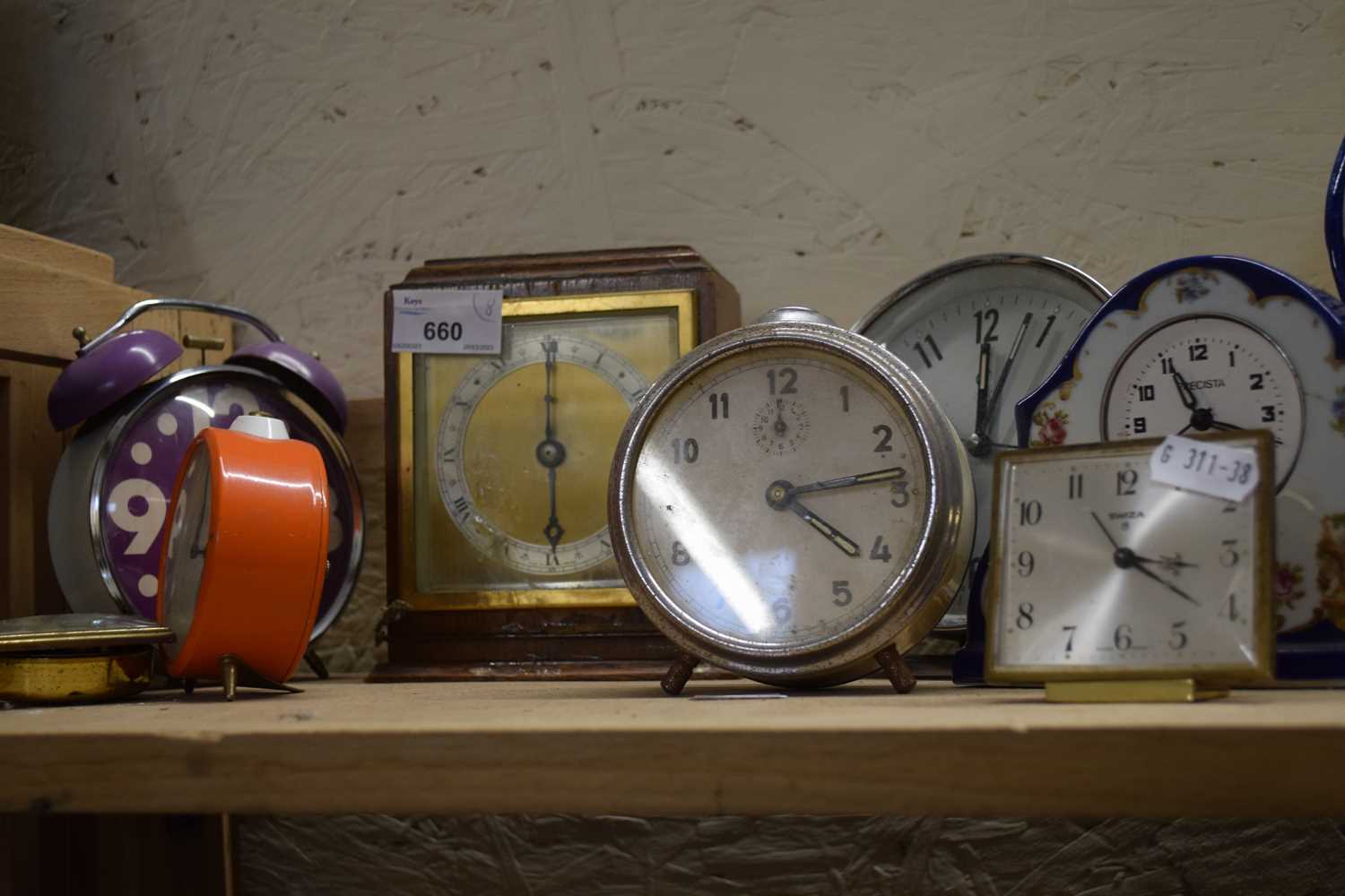 Eight various mantel and alarm clocks