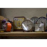 Eight various mantel and alarm clocks