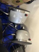 A pair of Delonghi circular speakers