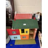 Two vintage dolls houses