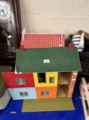 Two vintage dolls houses