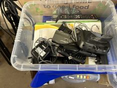 A box of assorted telephones and sundry electronic guides
