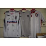 Three England football shirts