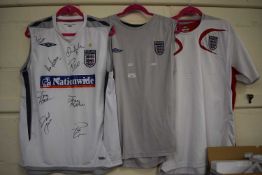 Three England football shirts