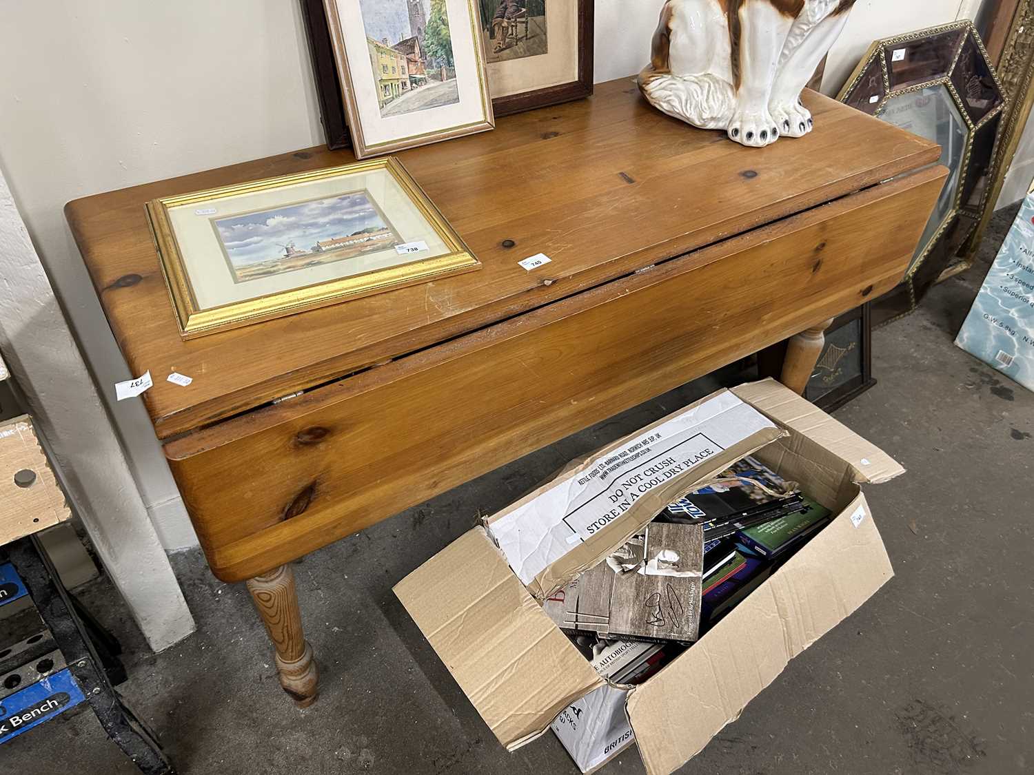 A drop leaf pine table, 120cm wide