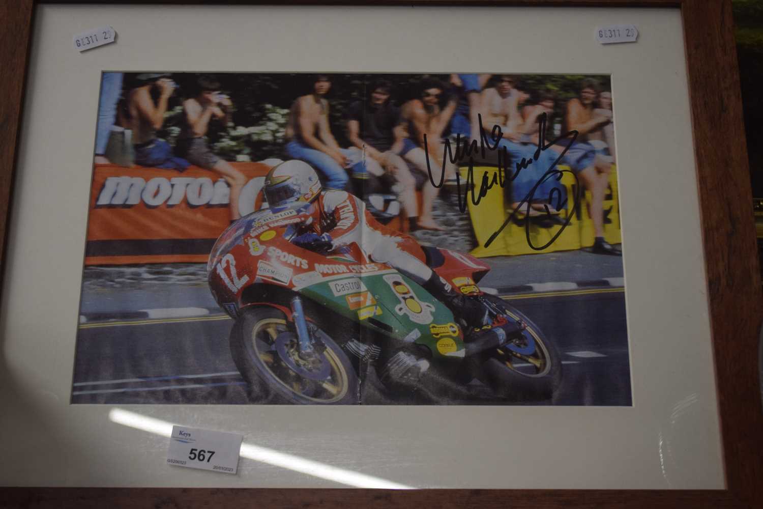 A signed photograph of motor cycling interest