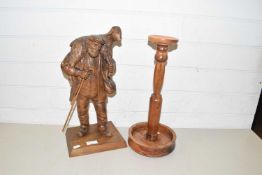 20th Century carved wooden model of a shepherd together with a turned wooden stand (2)