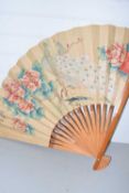 Large Chinese fan decorated with two peacocks