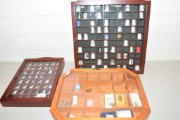 Collection of thimbles in three display cabinets