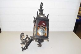 Metal and coloured glass lantern
