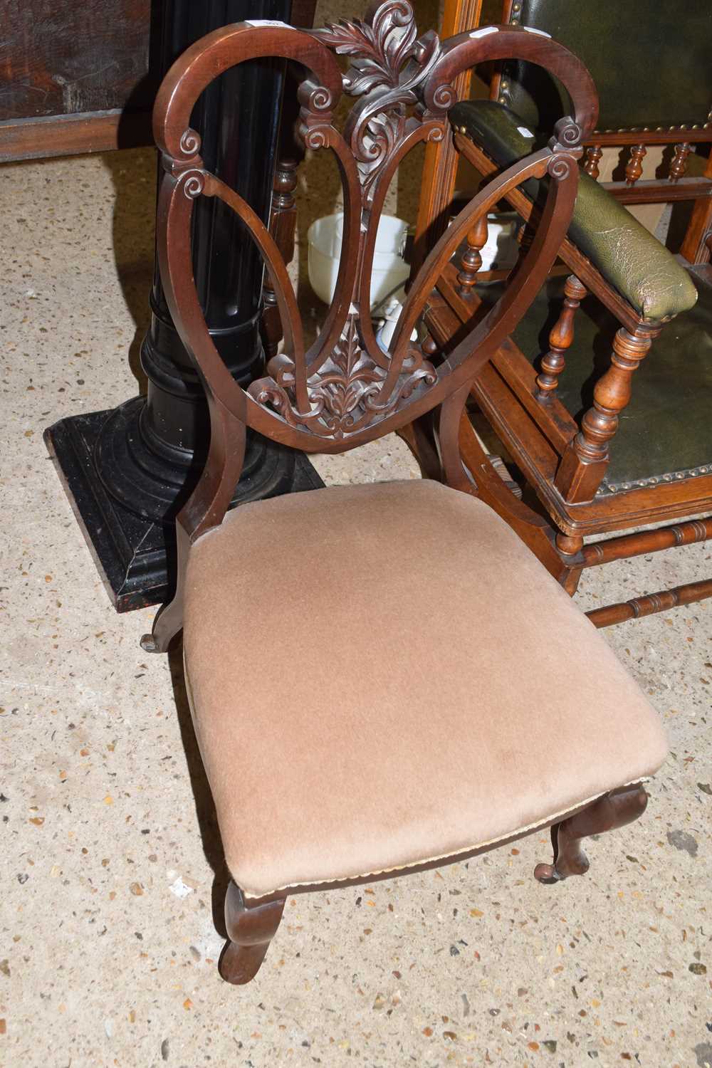 Late 19th Century shield back nursing chair on cabriole legs