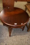 Reproduction mahogany veneered circular top coffee table