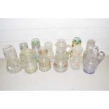 Collection of various floral decorated carafes with glasses plus further jugs and similar items