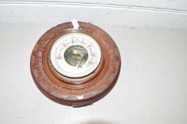 Late 19th Century aneroid barometer in carved wooden case