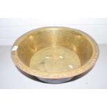 Large brass circular bowl