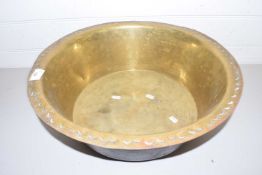 Large brass circular bowl