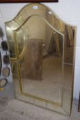 Modern arched bevelled wall mirror, 112cm high