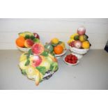 Collection of various ceramic fruit models