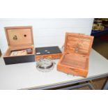 Mixed Lot: Three small cigar or humidor boxes all relatively modern together with leather cigar